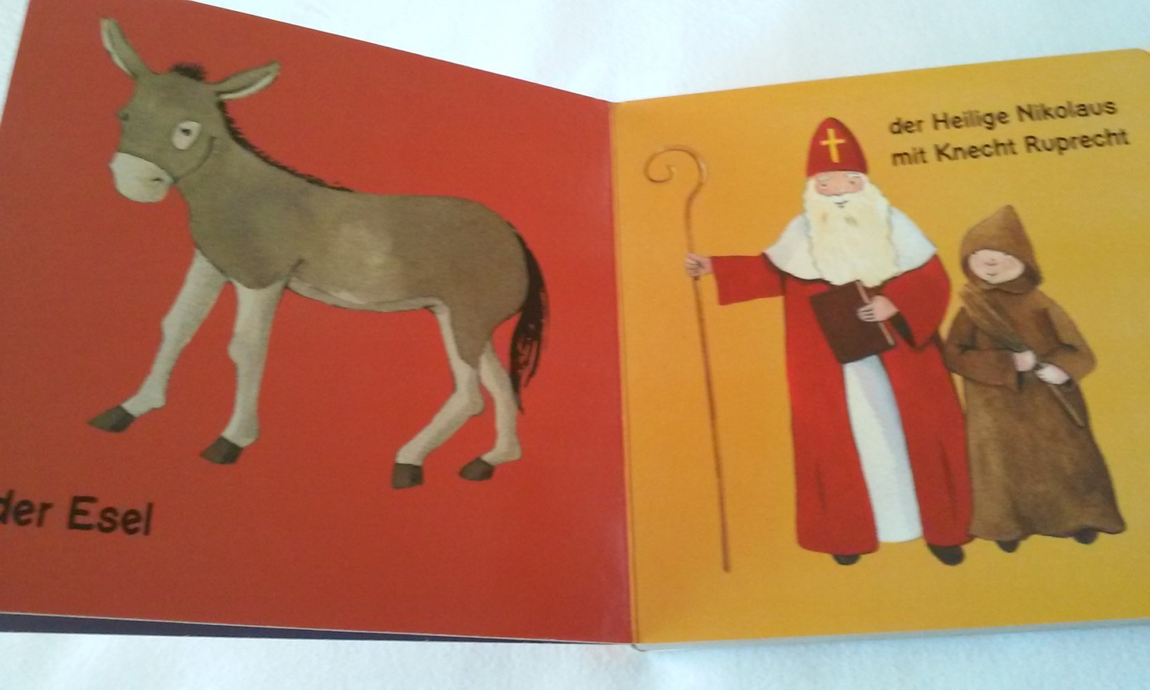 2 Kinderbücher/Weihnachtsbücher  Mein allererstes Weihnachtsbuch: Weihnachtsbaum und Kerzenschein; Weihnachtswerkstatt der Engel 1-3 Jahre