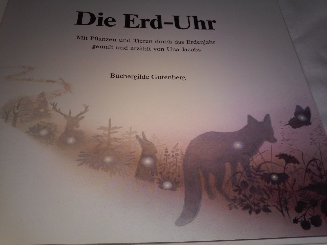 UNA JACOBS: Die Erd-Uhr - Mit Pflanzen und Tieren durch das Erdenjahr