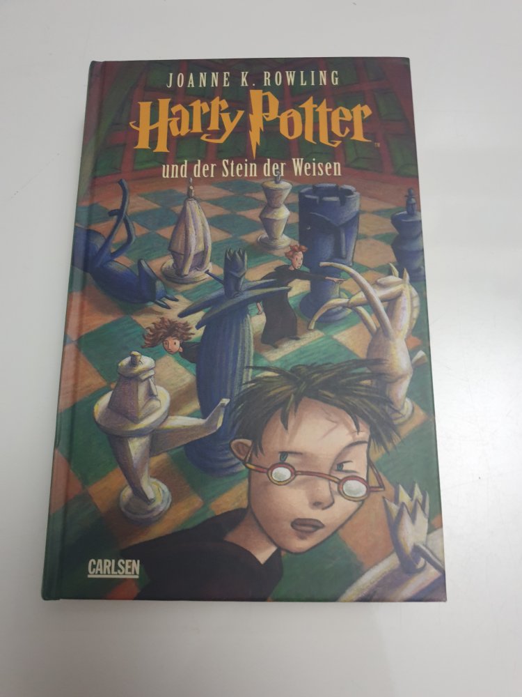 Harry Potter und der Stein der Weisen - Joanne K. Rowling