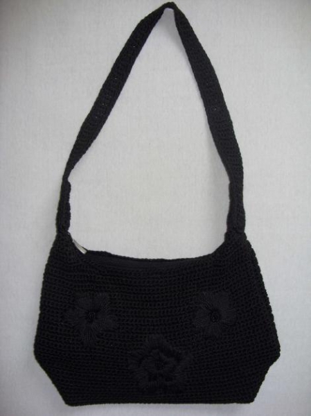 Schwarze gehäkelte Handtasche mit Hippie-Flair