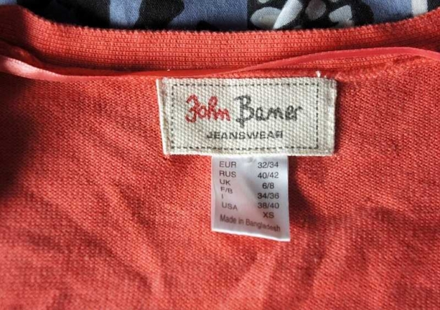 Schöne Strickjacke Jacke von John Baner Orange mit Fledermausärmel Gr. 32/34