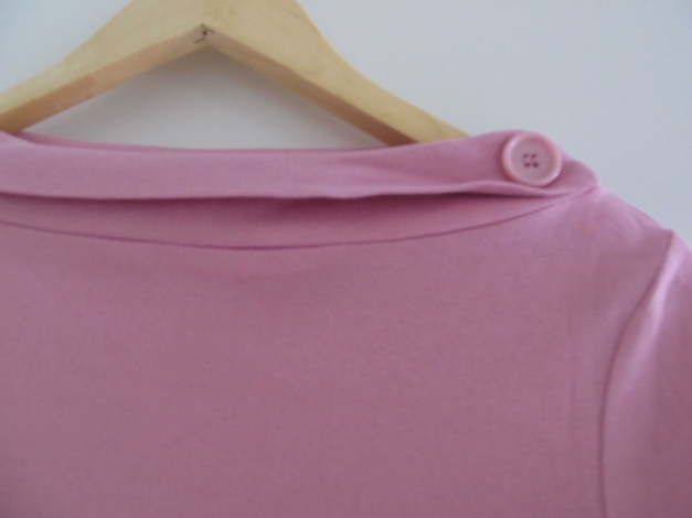 hübscher rosafarbener Pulli