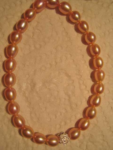 Armband Süßwasserperlen oval 6-7mm lachsfarben mit Rose 925er Silber