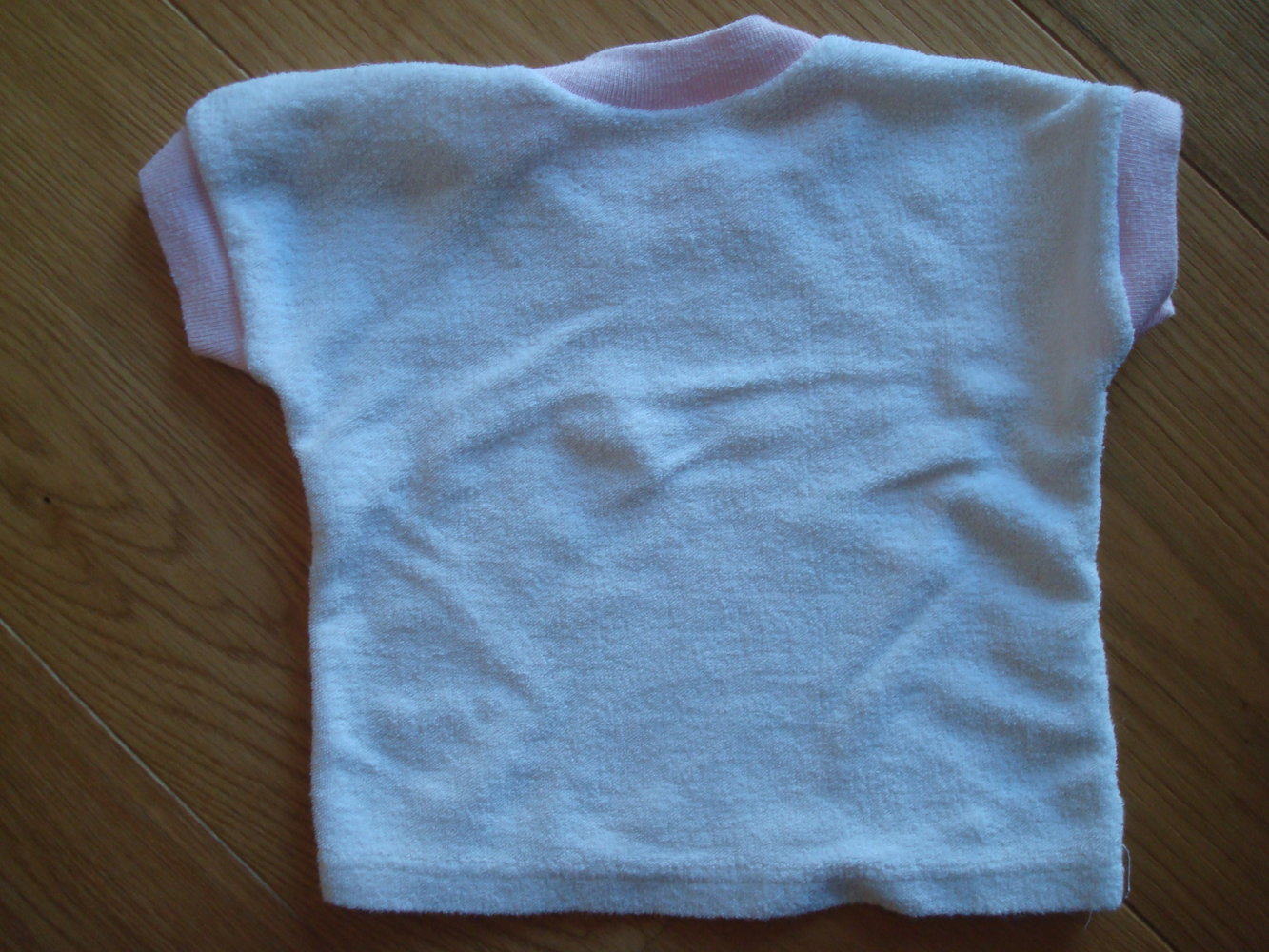 2 Kurzarmshirts / T-Shirts Gr. 62