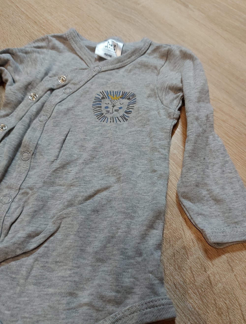 Grau mellierter Langarmbody Größe 62/68 Pocopiano