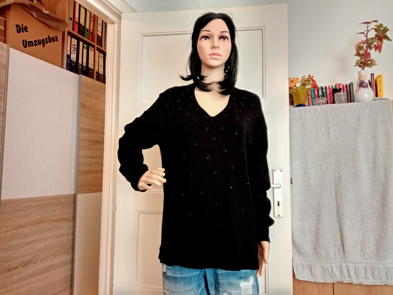 Schöner Pullover mit Straps-Steinen von Canda 