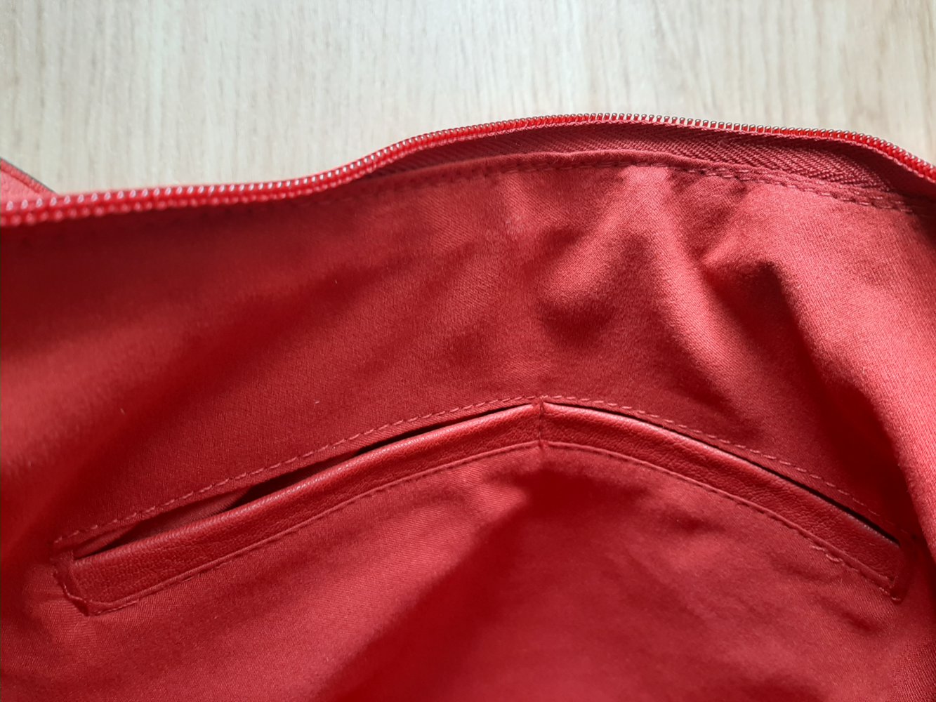 Tchibo Umhängetasche rot Lederer Optik