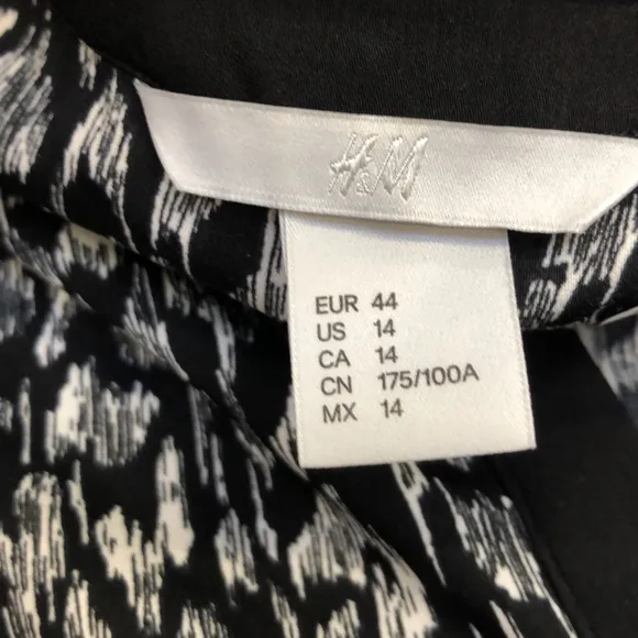 H&M Damen Kleid Gr.44 schwarz weißes Muster