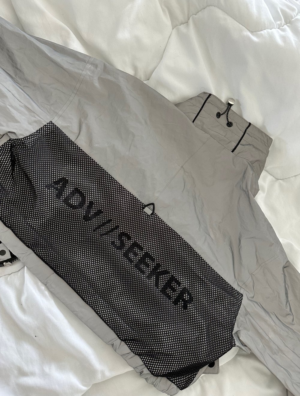 kurze reflektierende Jacke