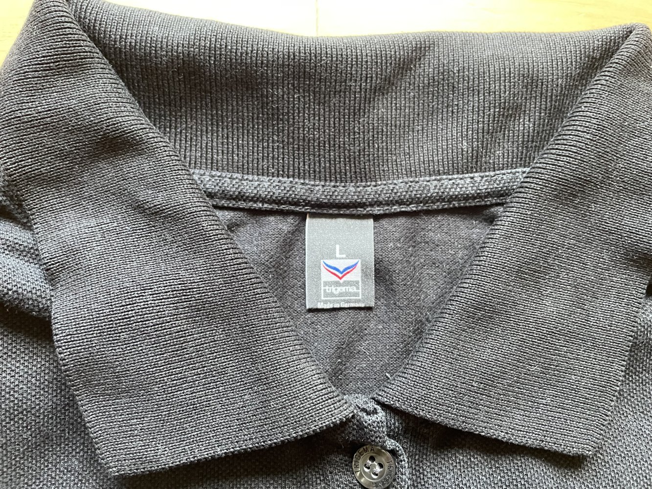 Trigema Poloshirt L schwarz