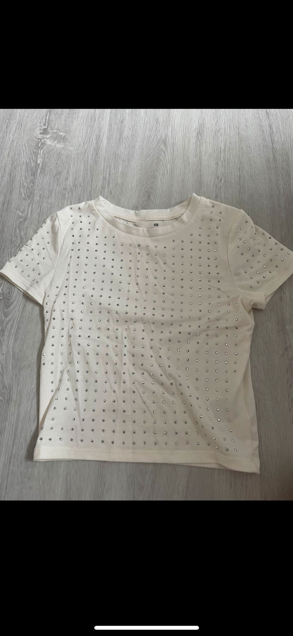 verschiedene Oberteile von H&M Mädchen