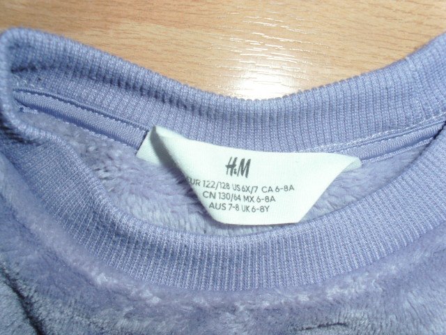 Fleecepullover von H&M, pastelllila mit Motiv, Gr. 122/128