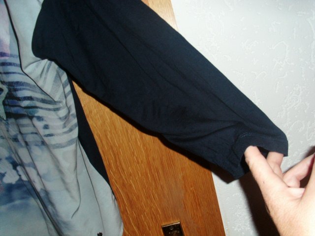 Langarmshirt von Gina Laura, schwarz mit Motiv, Gr. 50/52