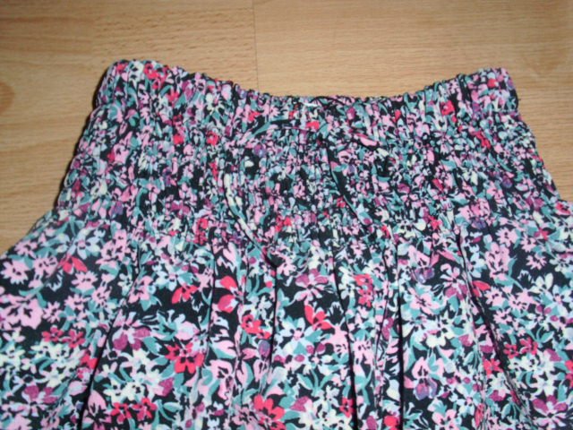 Rock von Zara, schwarz-pink, Gr. 122