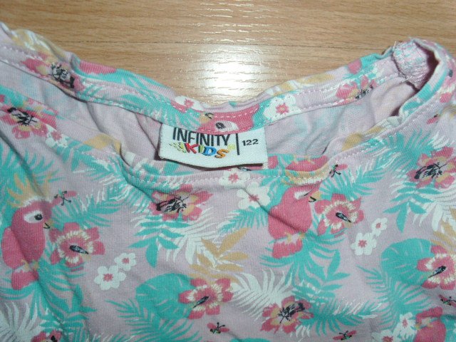 Kleid von Infinity, rosa mit Motiven, Gr. 122