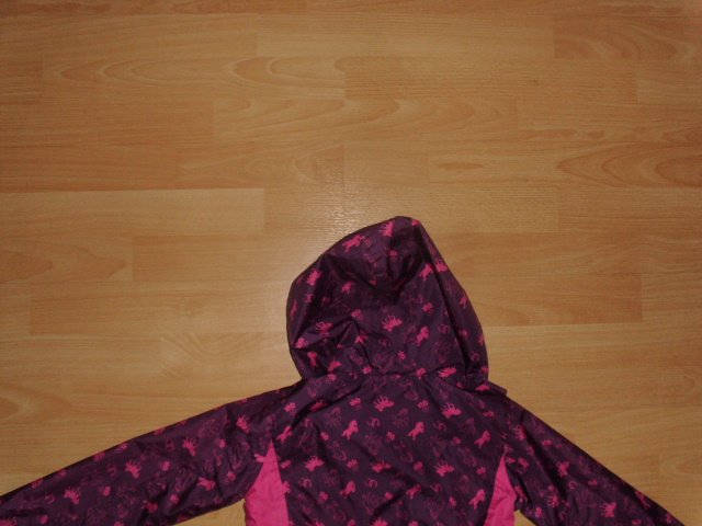 Regenjacke von Topolino, pink-lila mit Pferden, Gr. 128