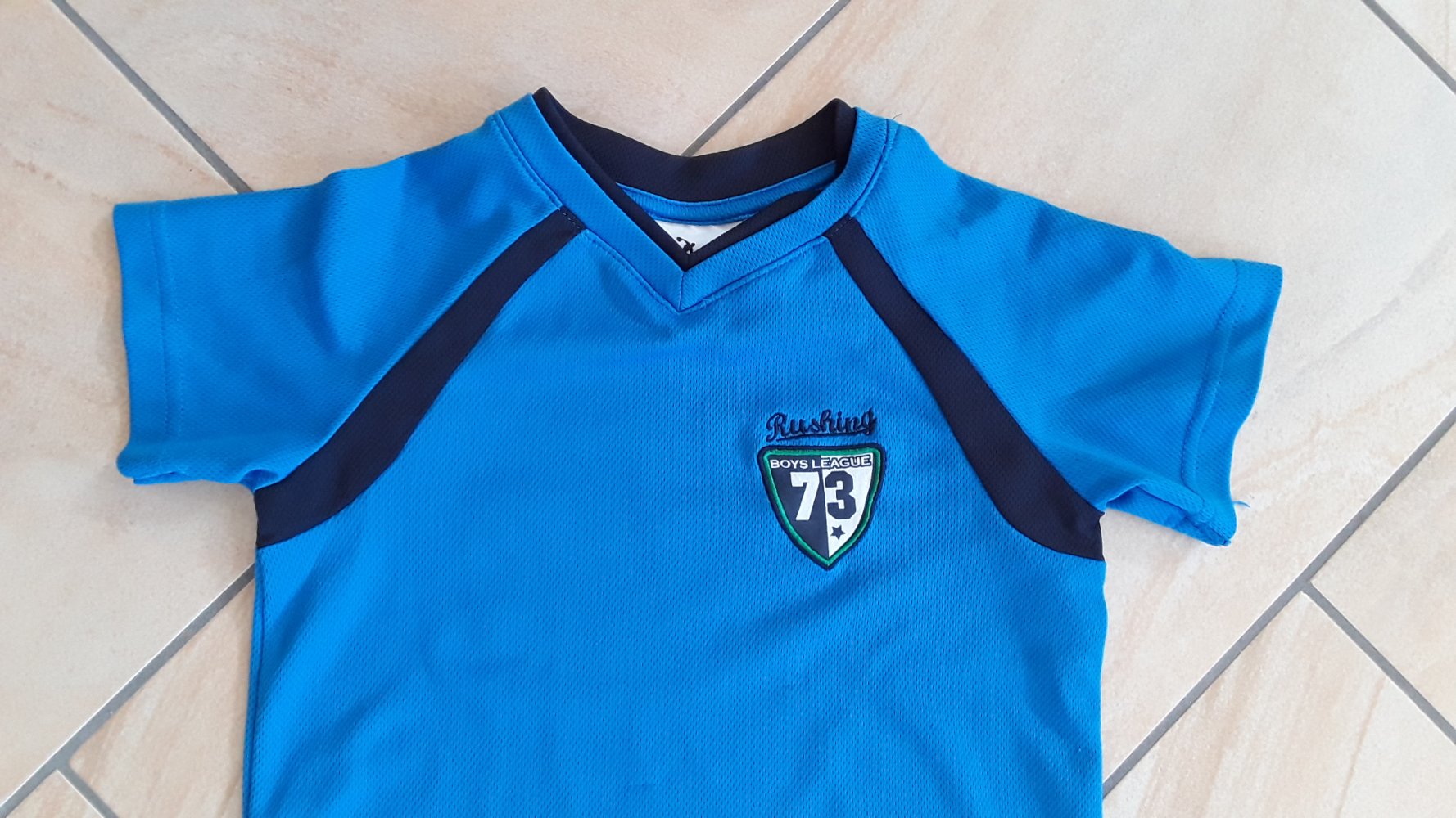 blaues Sport-T-Shirt in Gr. 104