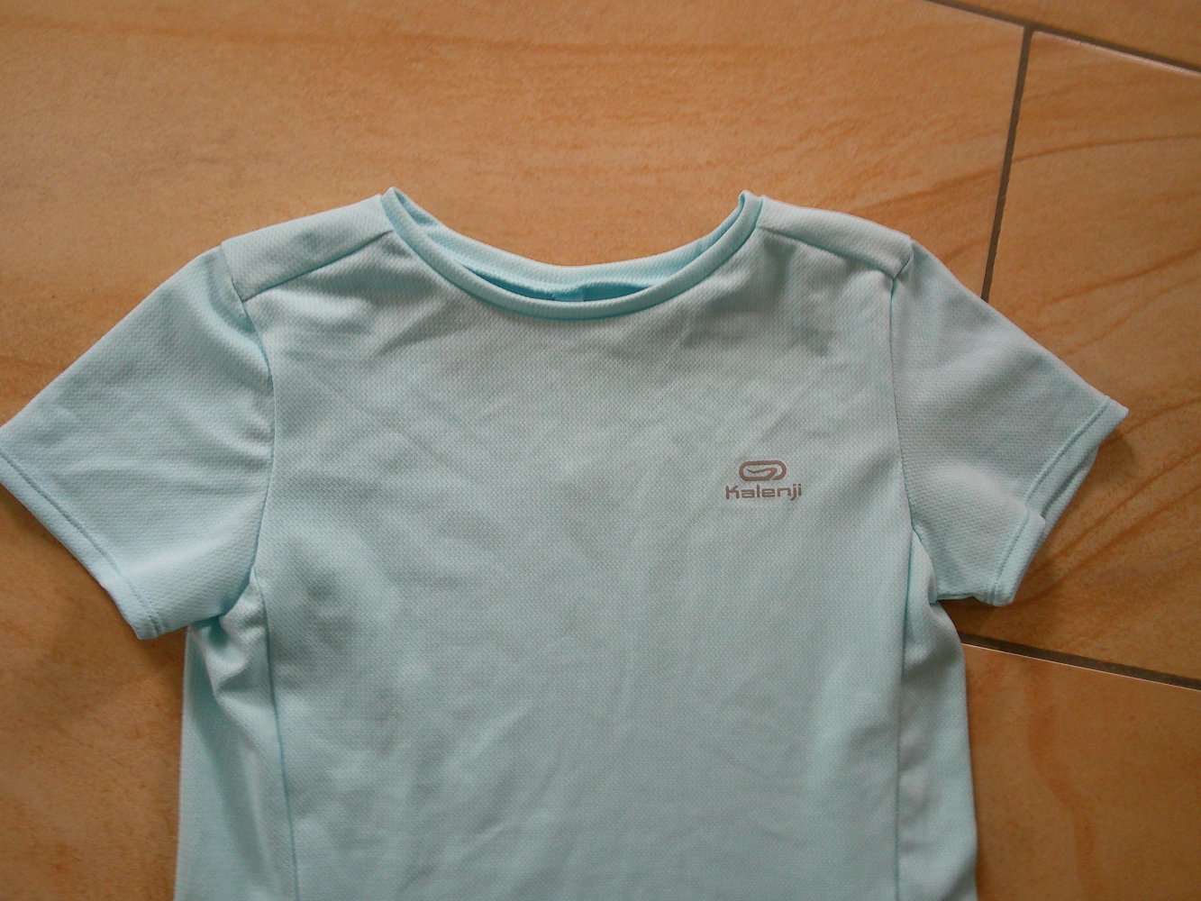 hellblaues Sportshirt Größe 128 von Decathlon