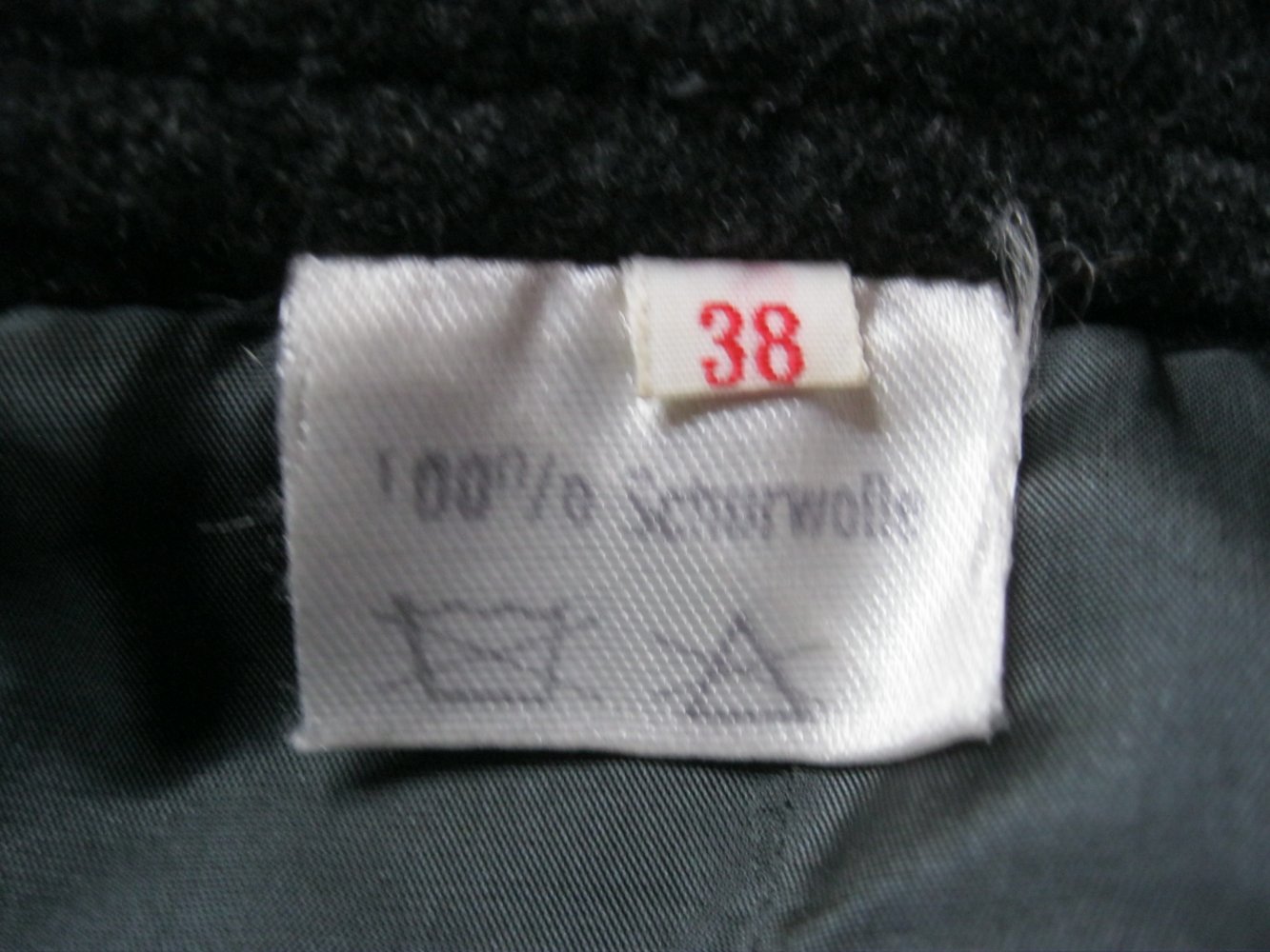 Rock # 100% Schurwolle # Grau meliert # 38