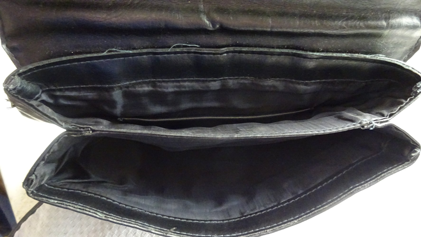 Cluch sschwarz Leder