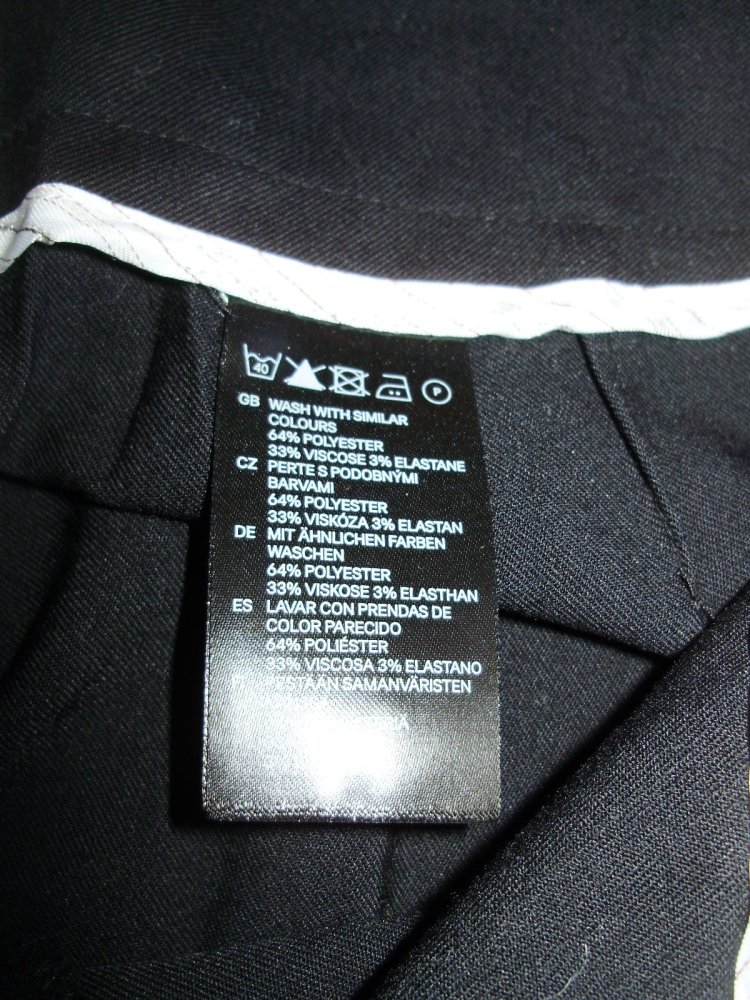 H&M Hose weit schwarz edel business interessanter Bund 34 S
