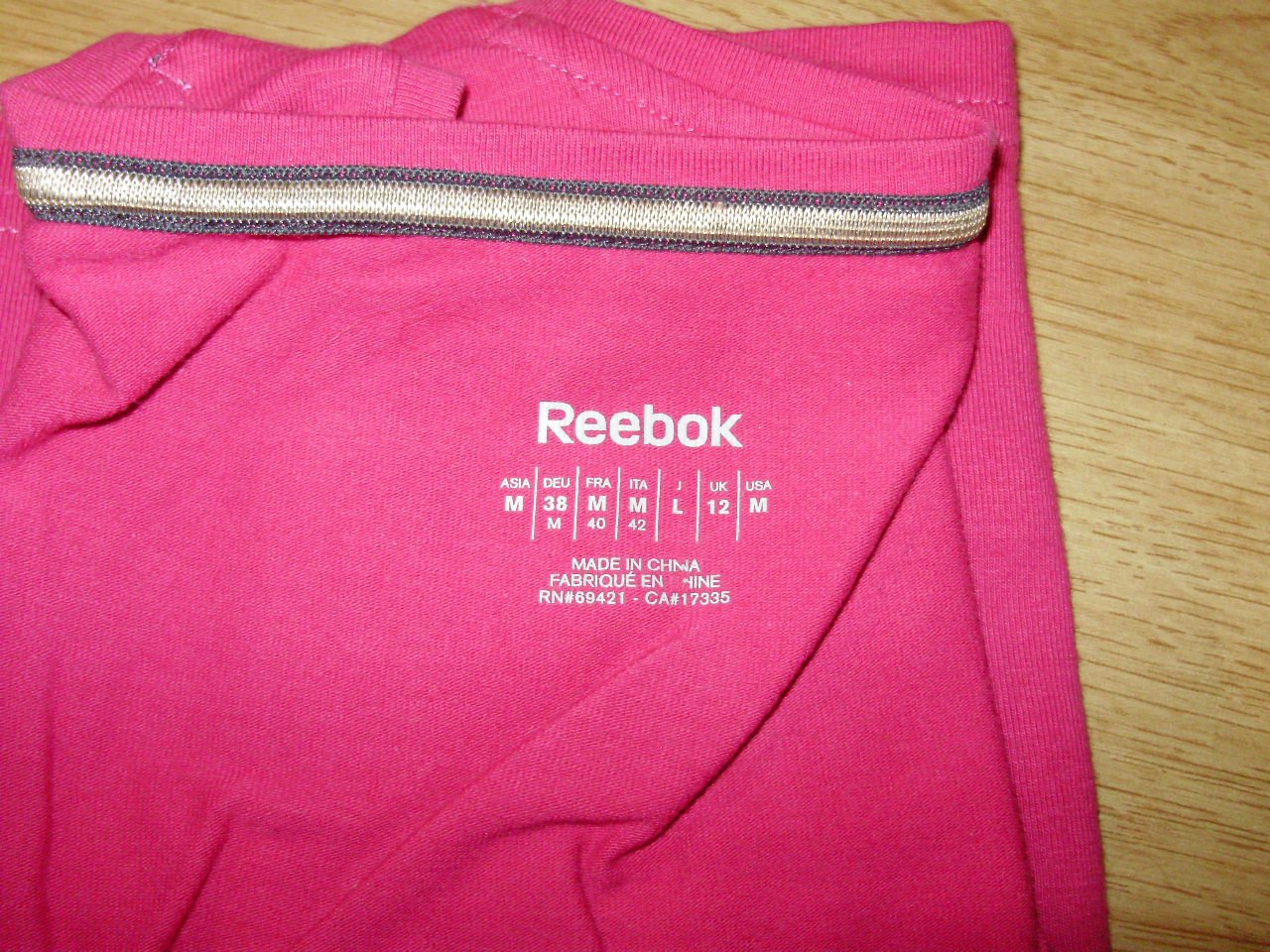 Reebok Top pink Glitzer Label Print 38 M wie neu