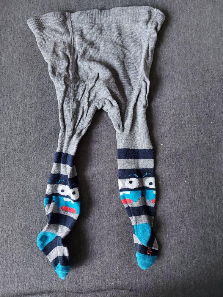 graublaue Babystrumpfhose mit kleinen Monstern Gr. 62/68