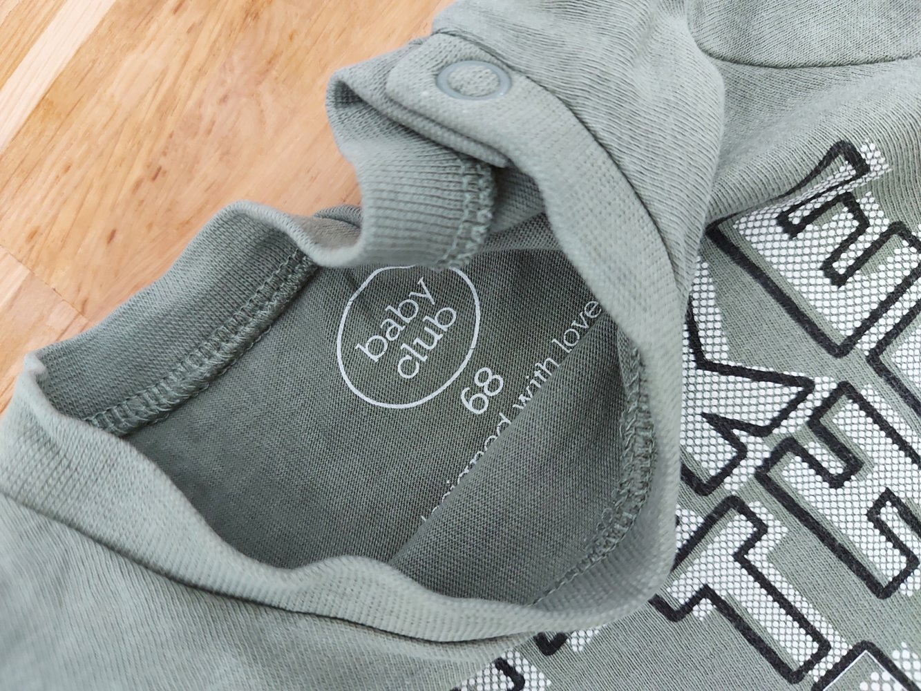 langärmliger olivgrüner Babypullover Gr. 68 I make all the girls smile