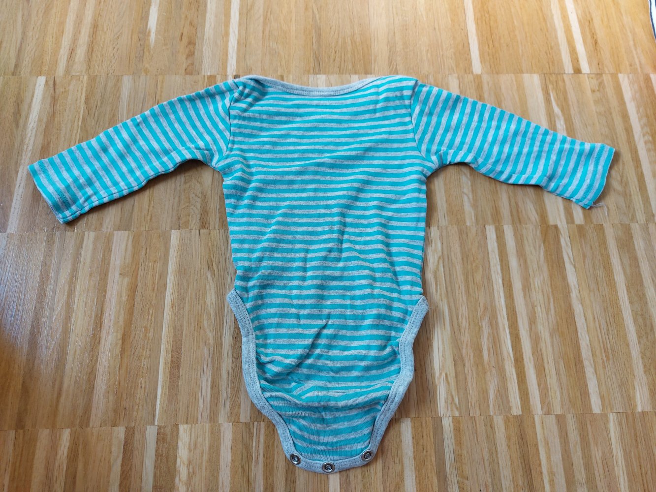 graublau gestreifter Langarmbody von H&M Gr. 56
