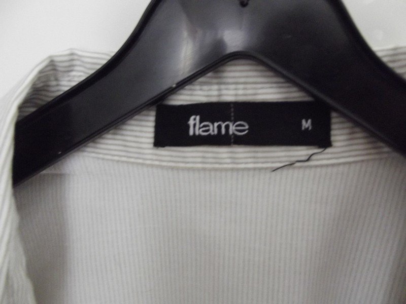 Sehr schöne Bluse mit Gürtel von flame 